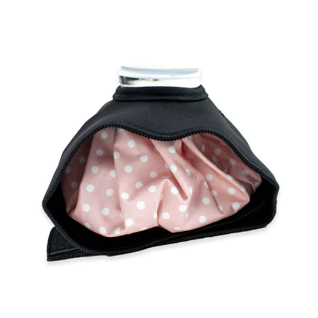 Black neoprene cover with pink polka dot lining on a white background