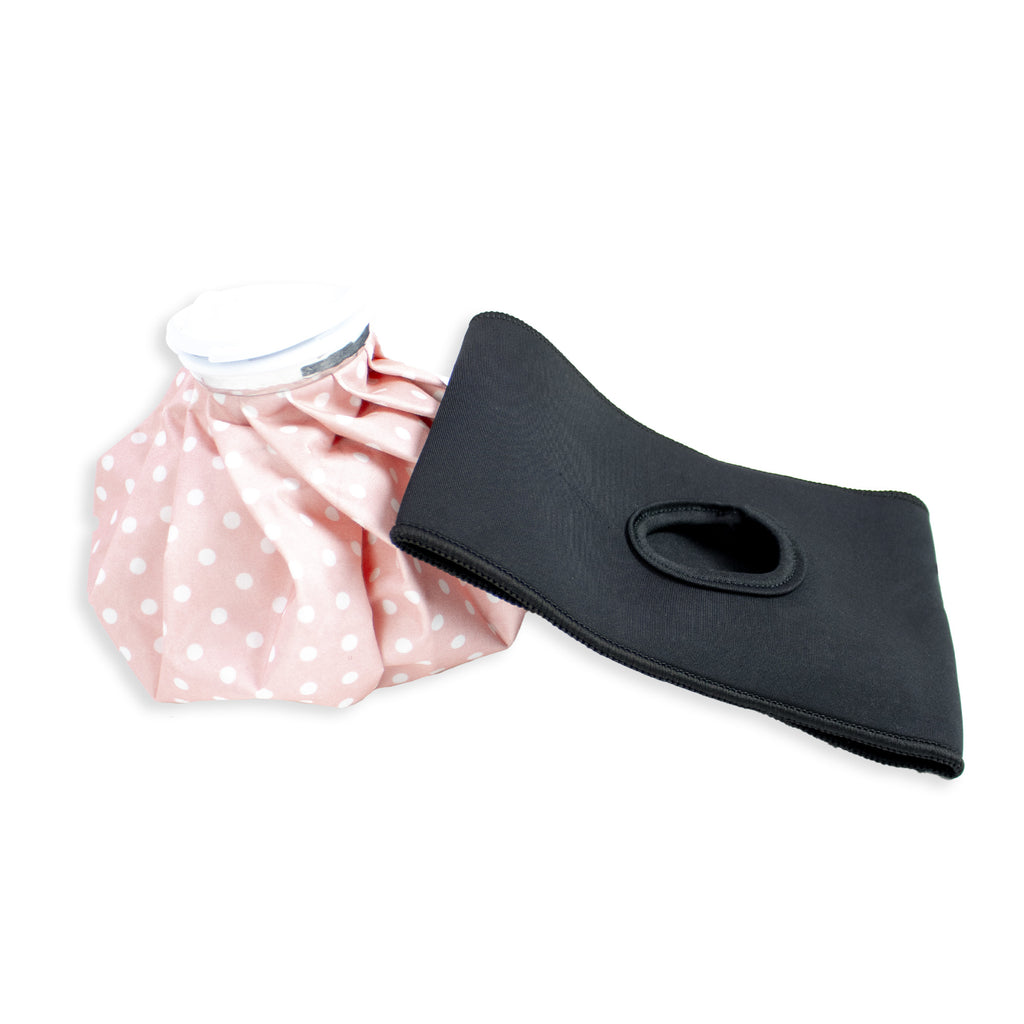 Black neoprene sleeve and pink polka dot fabric on a white background