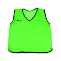 Green sports bib with black trim on a white background