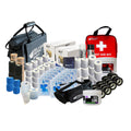 Collection of medical supplies including bandages, sprays, and a first aid kit on a white background.