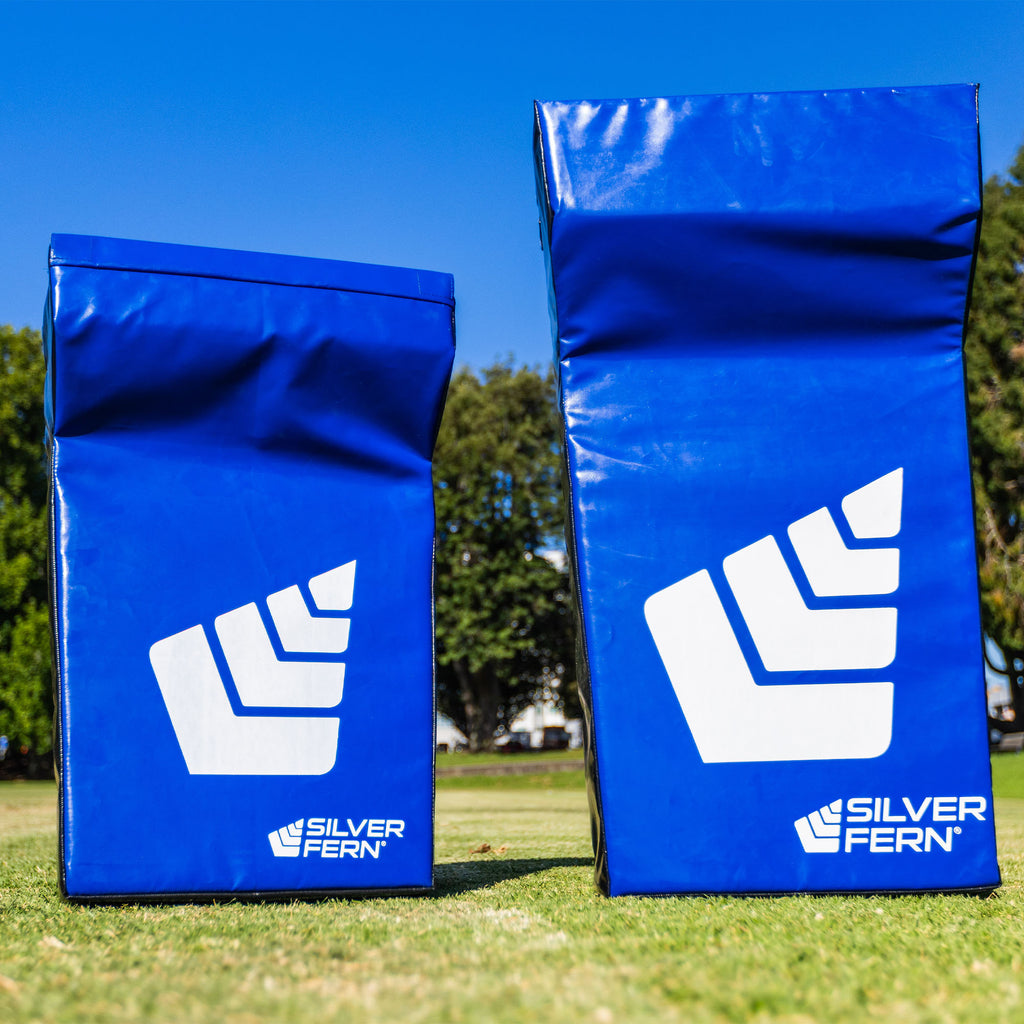Hit Shield Wedge, Senior and Junior size side by side, lifestyle shot