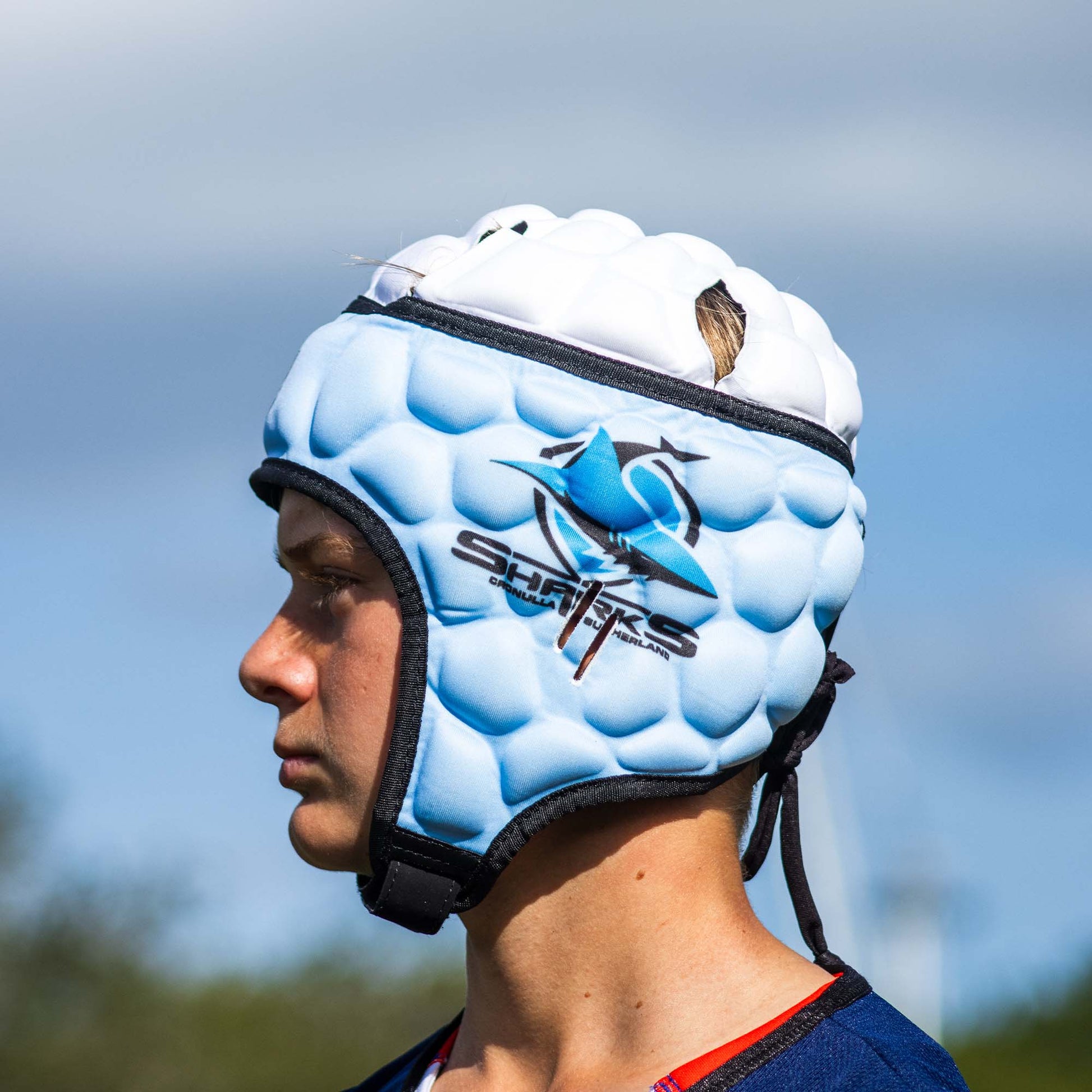 Official NRL Headgear, Cronulla-Sutherland Sharks, lifestyle image, side.