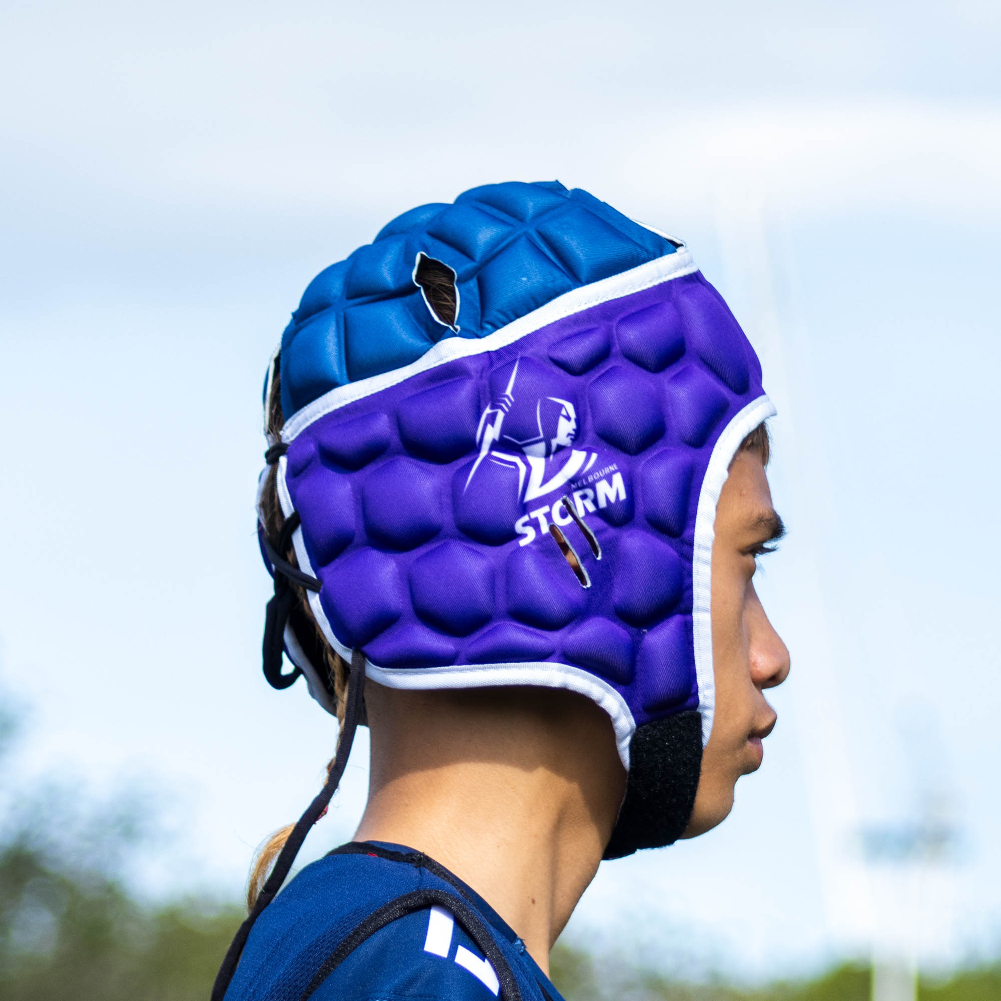 Official NRL Headgear, Melbourne Storm, lifestyle image, side.