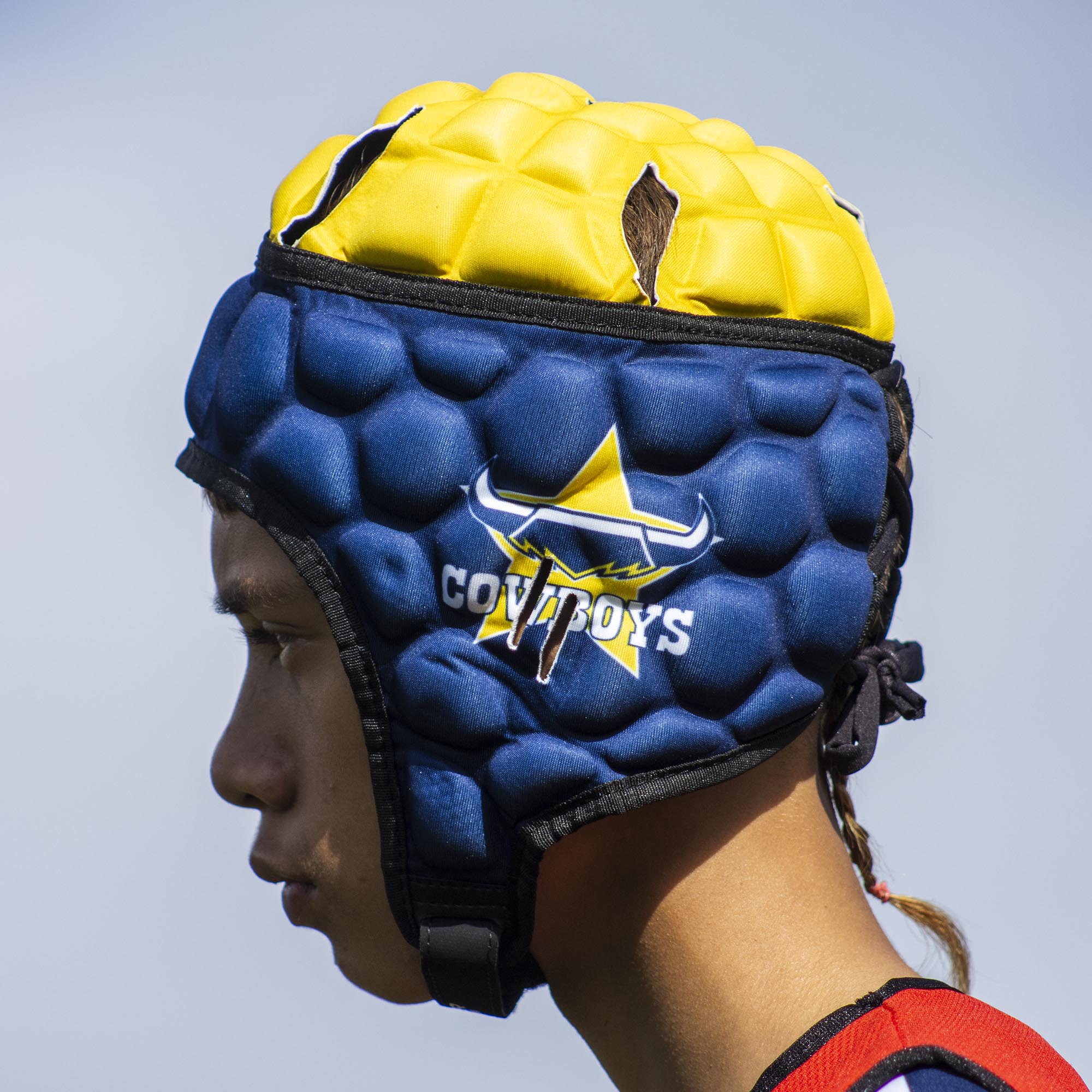Official NRL Headgear, North Queensland Cowboys, lifestyle image, side.