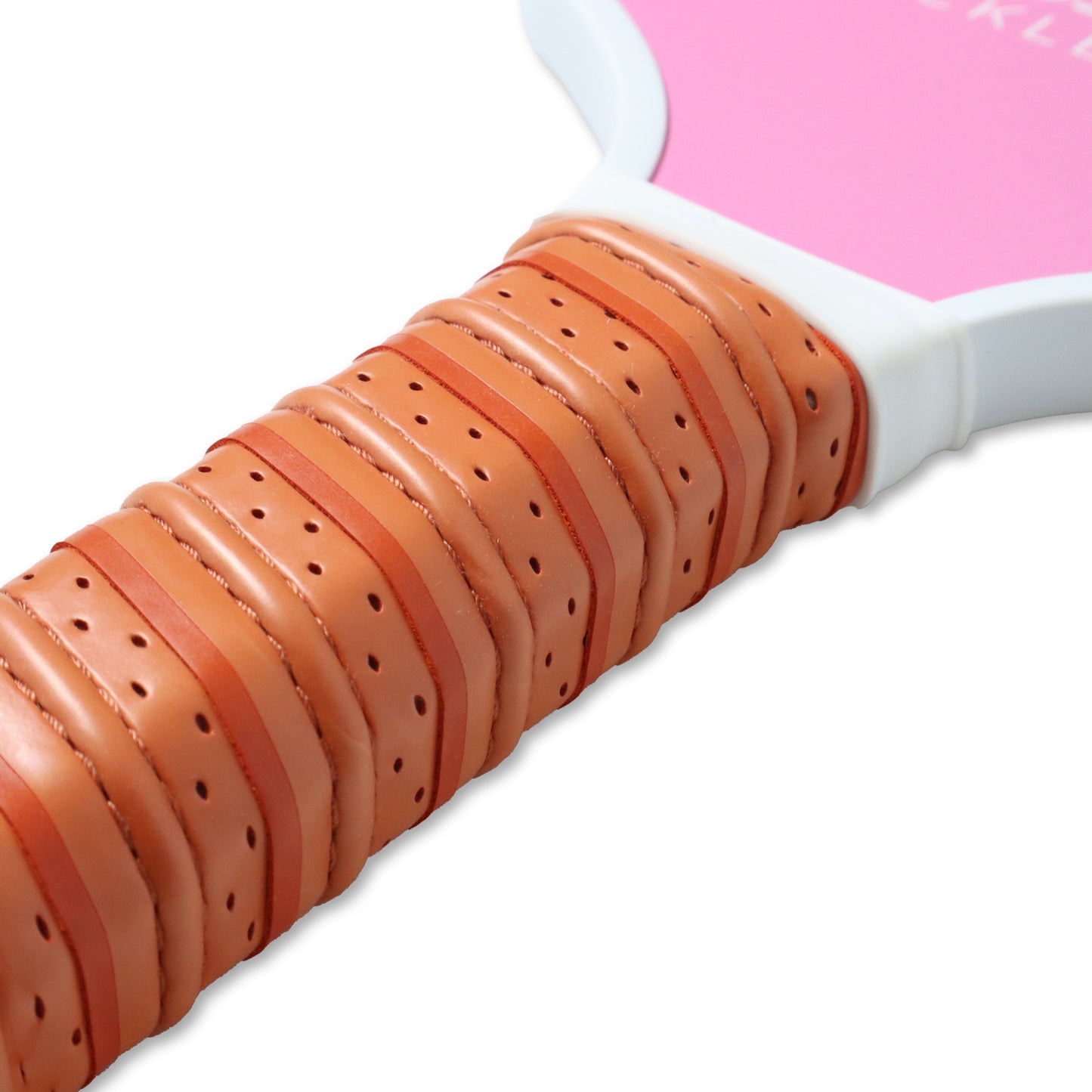 pickleball baseline pink paddle, close up of brown handle white background image. 