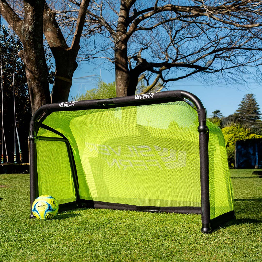 Silver Fern Soccer Goal, lifestyle shot, goal sitting on a backyard.