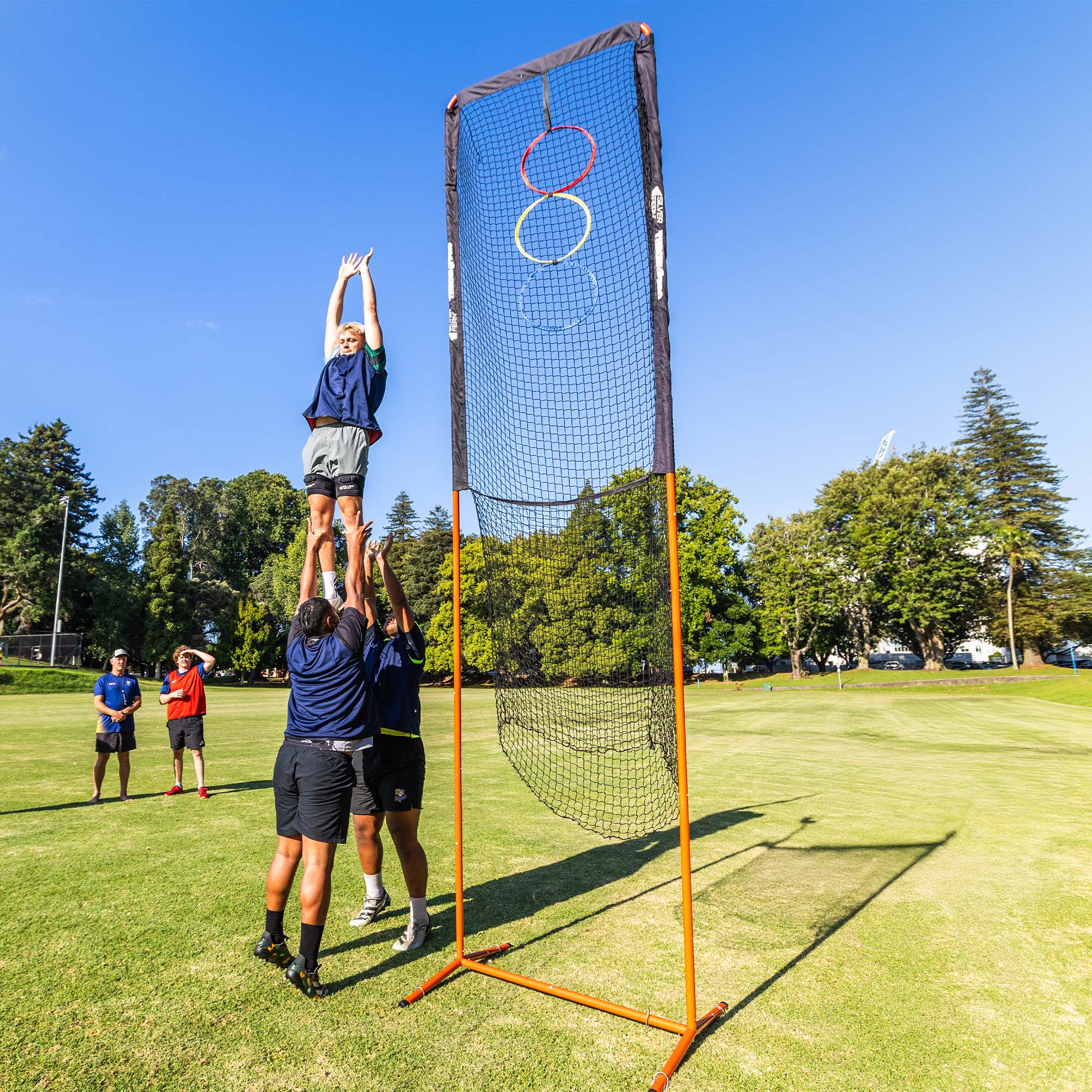 ThrowPro Lineout Target Throwing Net, lifestyle shot, lineout player being lifted next to the ThrowPro.